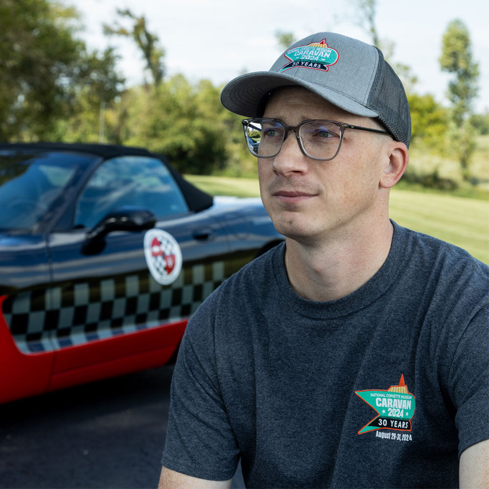 Man wearing the 2024 National Corvette Museum Caravan Event T-shirt showing the emblem on the front left chest