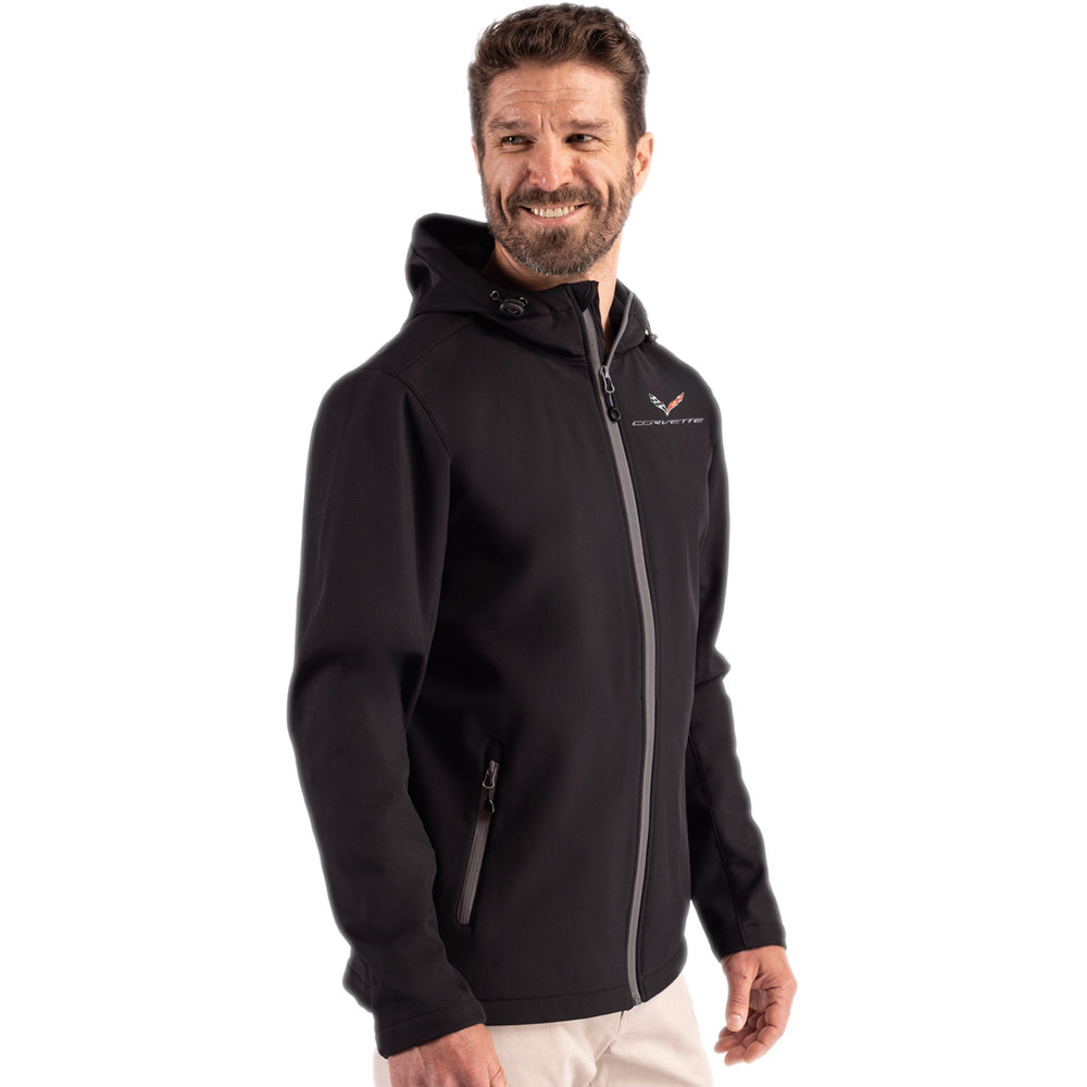 Man wearing a black Corvette jacket  with a C7 Corvette logo on a white background