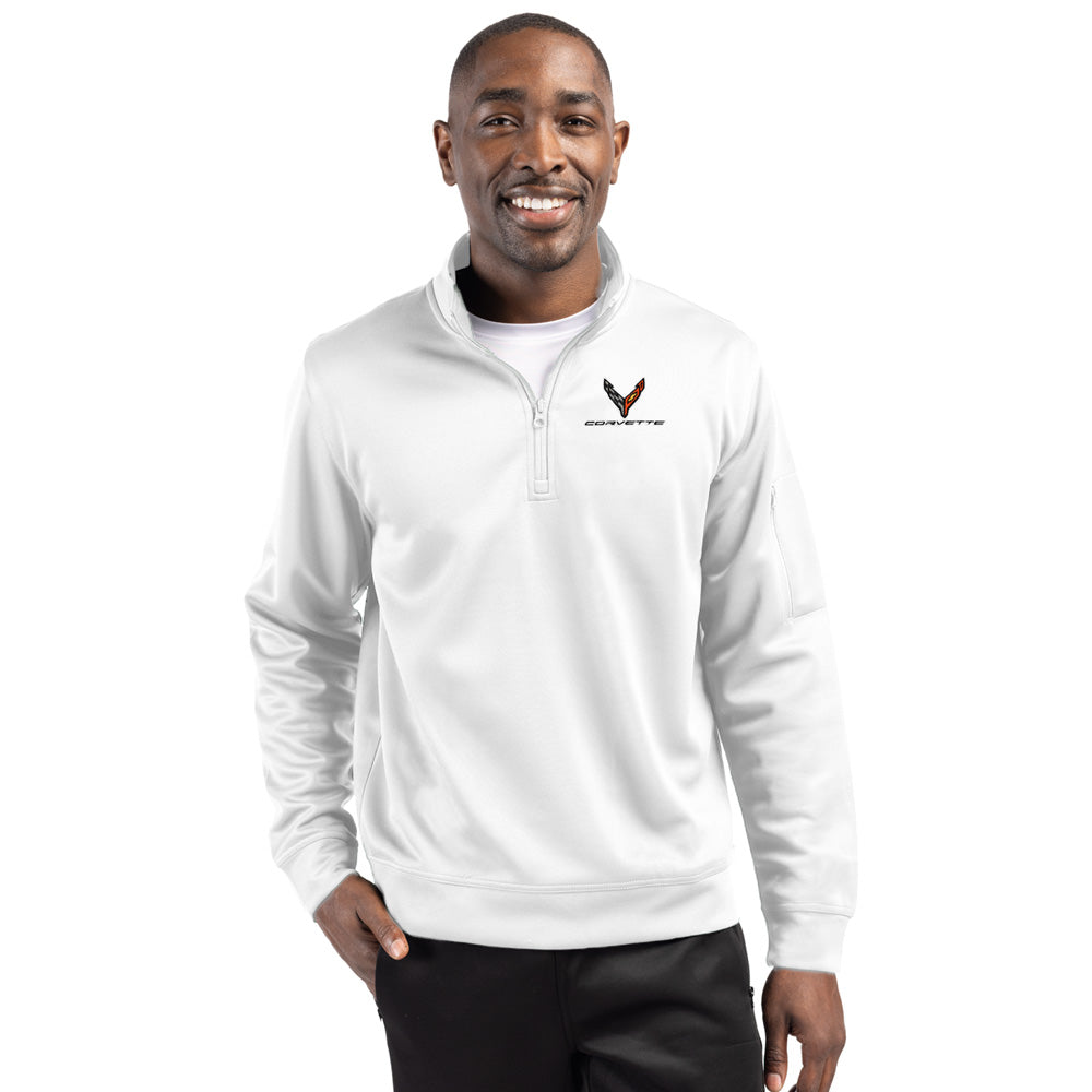 Man wearing a white quarter-zip pullover with a C8 Corvette emblem on a white background