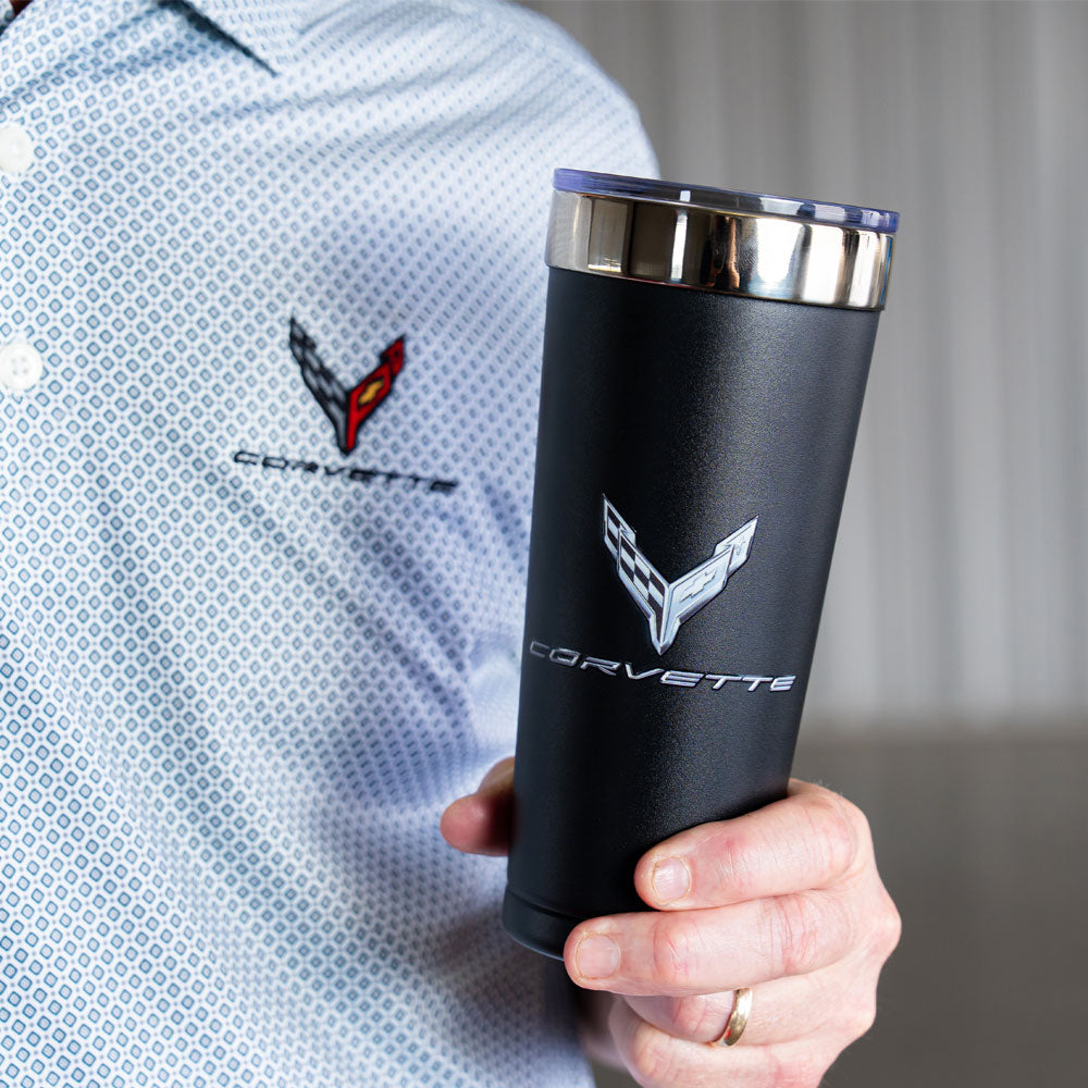 Man holding the 8th Generation Corvette Emblem Metallic Tonal Black Tumbler in his hand.