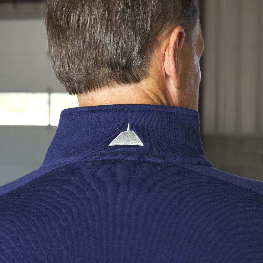 Close up of the NCM Skydome embroidered on the back neck of the Navy quarter-zip
