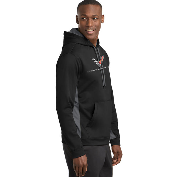 Man wearing a black C8 Corvette hoodie on a white background