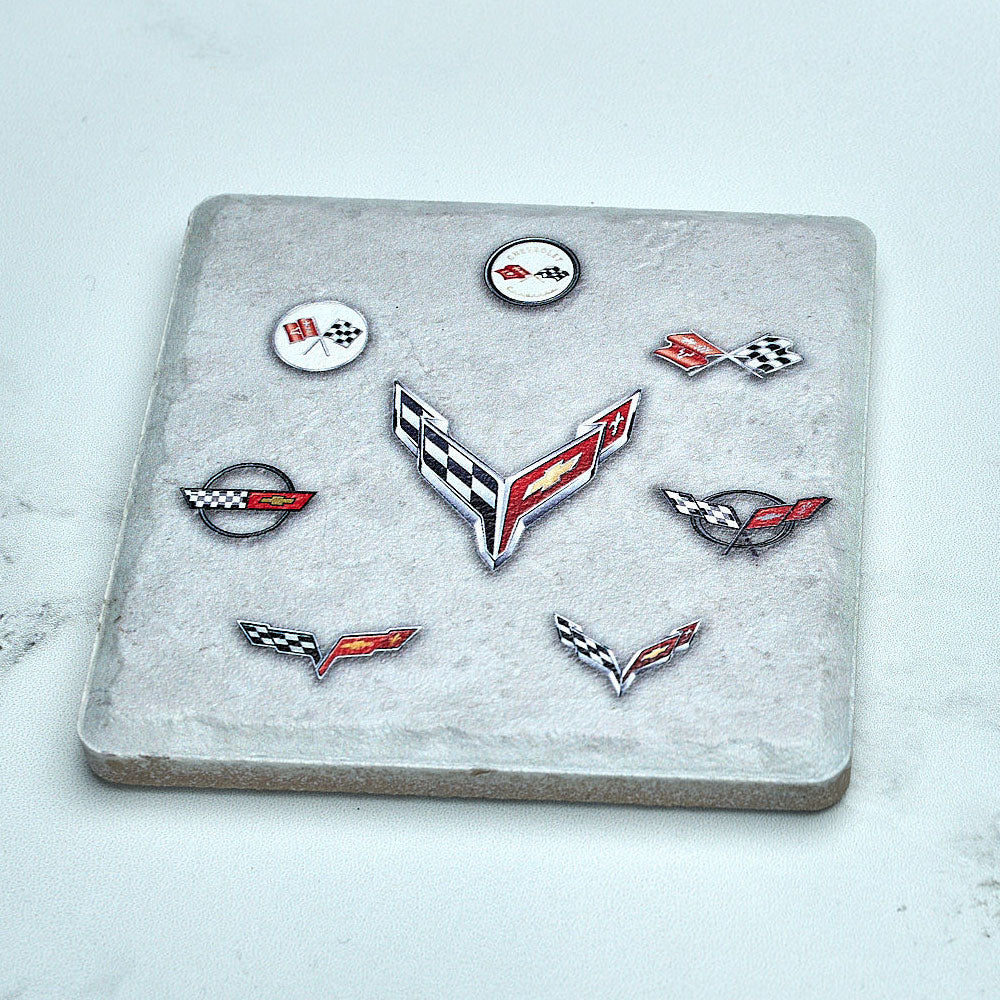 C1-C8 Emblems Coaster Sitting on a table