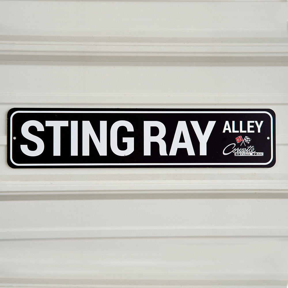 C2 Corvette Sting Ray Alley Tin Sign Hanging on a wall