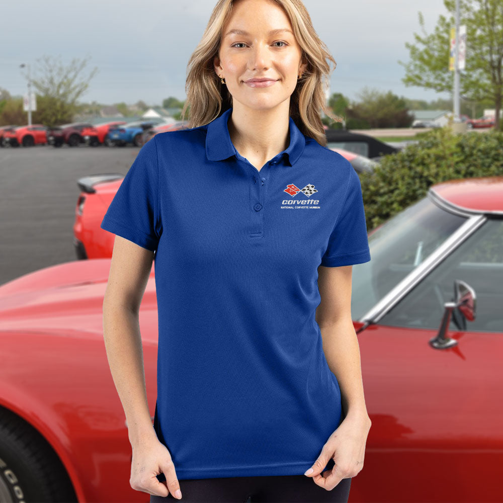 Woman wearing the C3 Corvette Emblem Ladies Core Tour Blue Spin Polo
