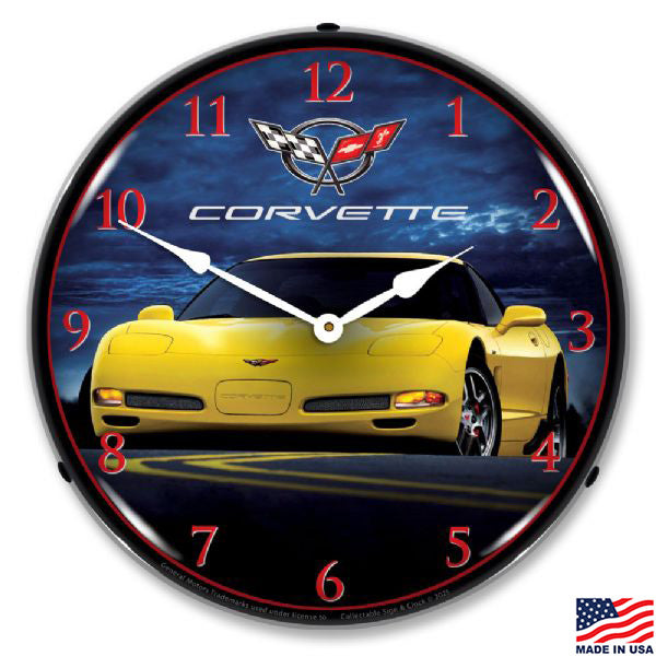 Wall clock with an image of a yellow C5 Corvette Z06 in front of a background of storm clouds.