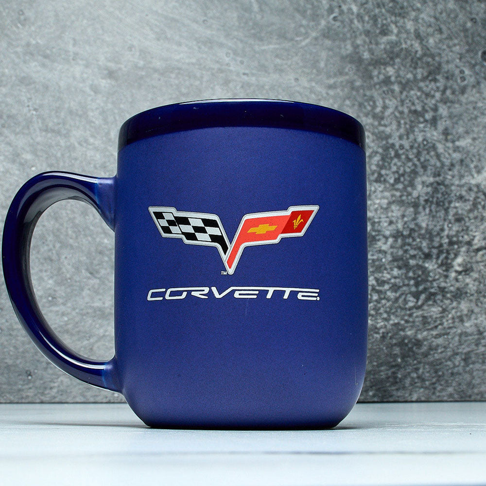 C6 Corvette Modelo Cobalt Coffee Mug sitting on a table