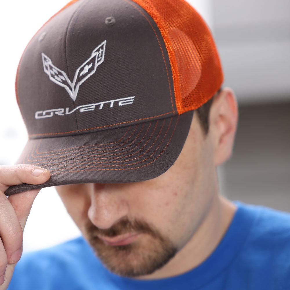 Man wearing the C7 Corvette MVP Charcoal and Orange Trucker Cap