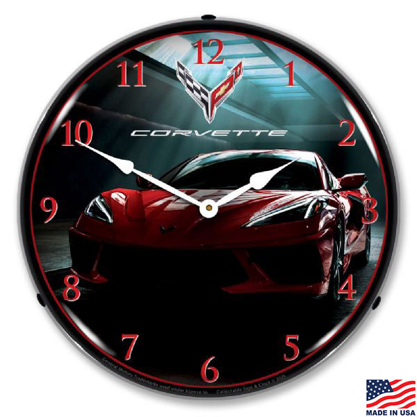 Wall clock with a red C8 Corvette design and with red numerals and white hands.