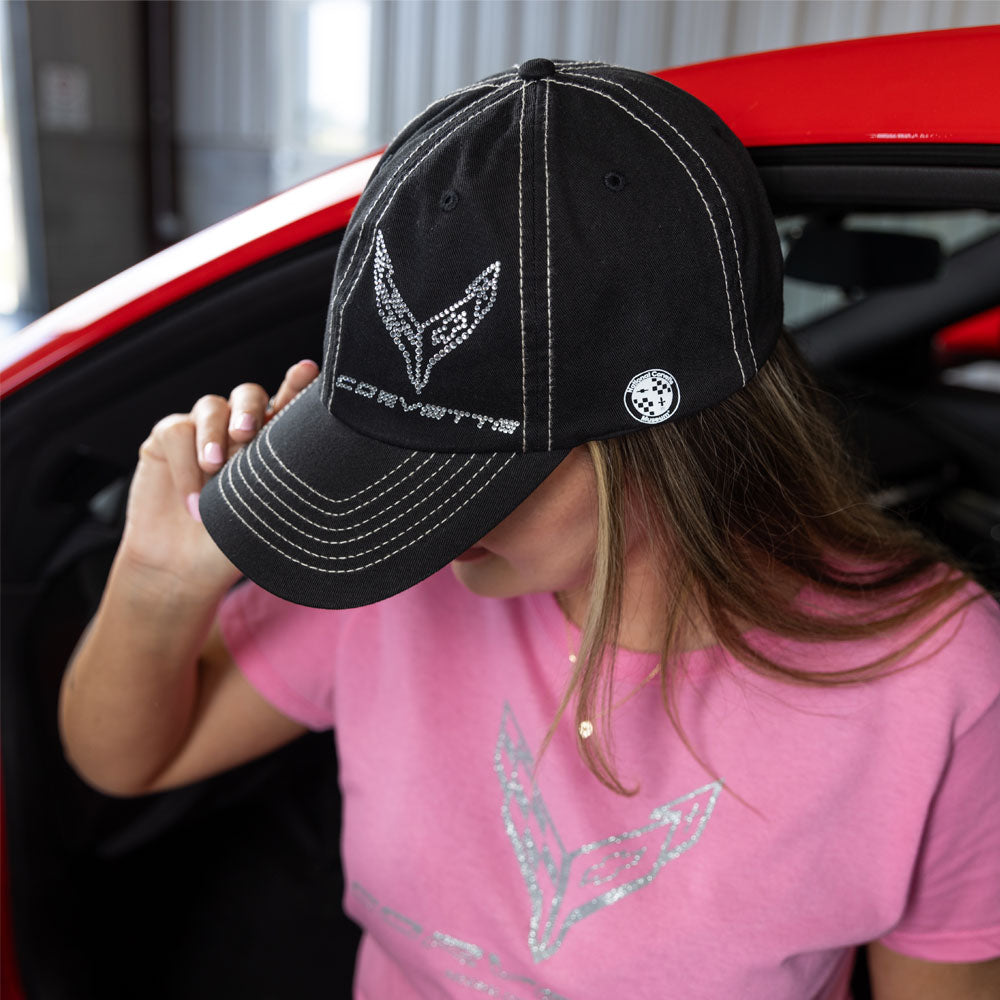 Woman wearing the C8 Corvette Crystal Emblem Stitched Ladies Black Cap