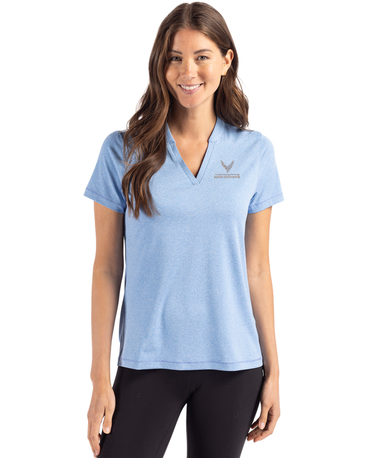 Woman wearing the C8 Corvette Custom Ladies No Collar V-Neck Heather Blue Polo