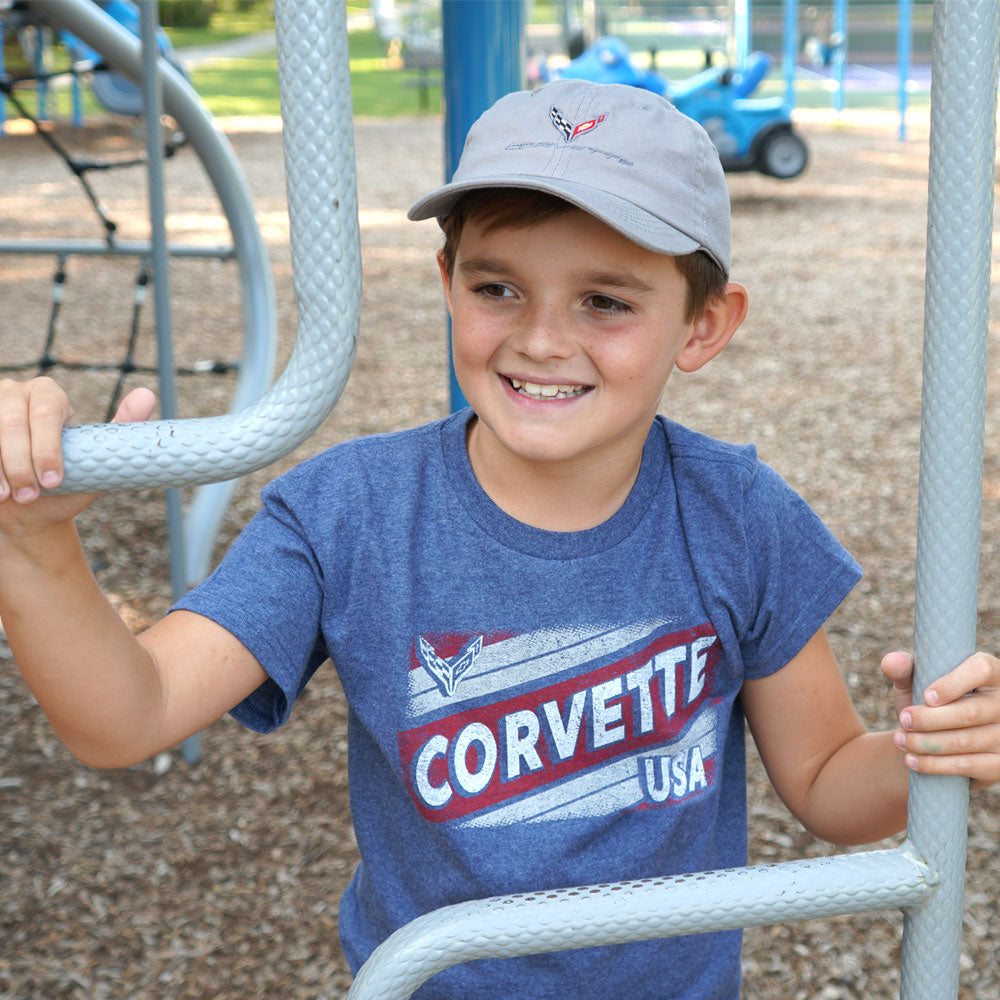 Young boy wearing the C8 Corvette Emblem Childrens Gray Cap