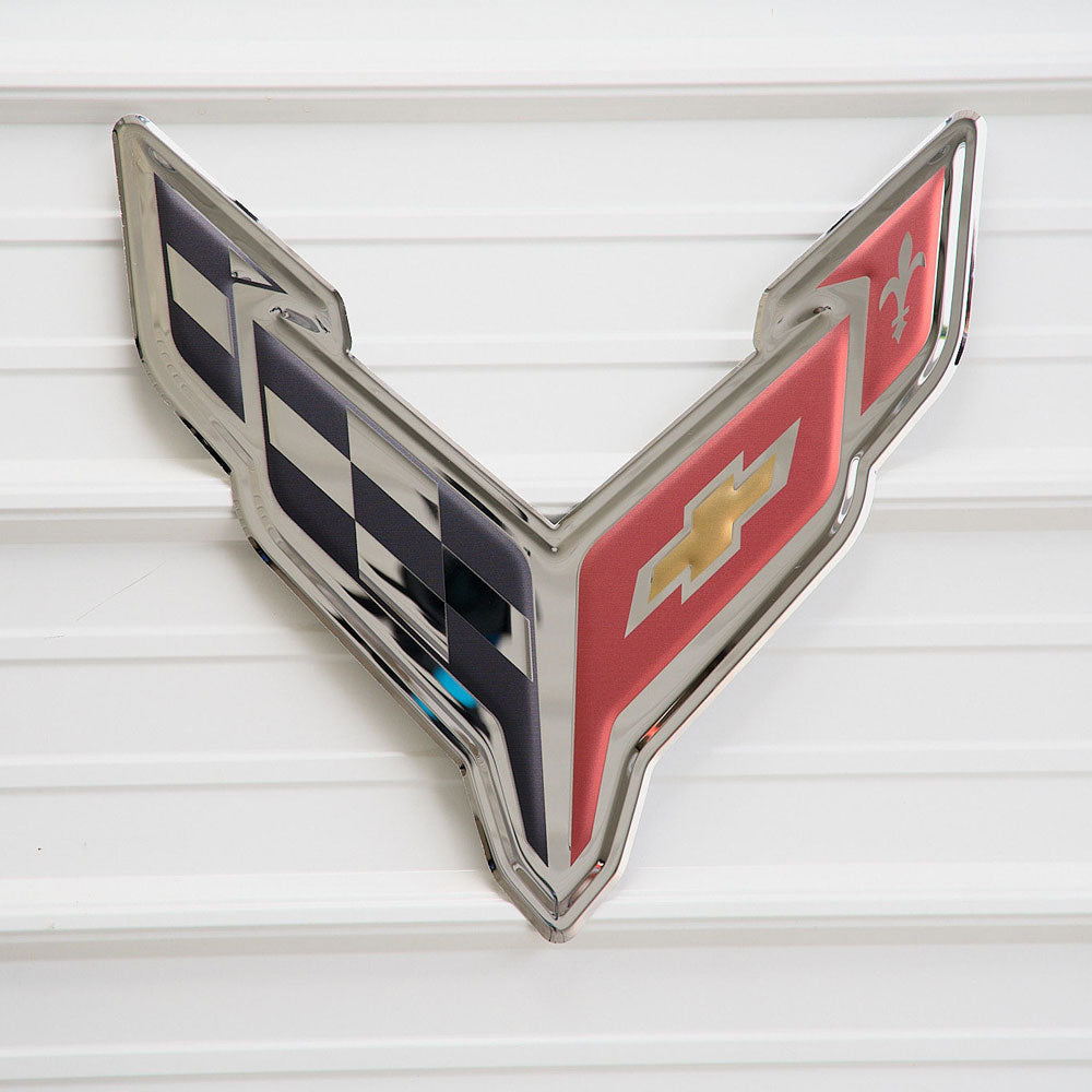 C8 Corvette Emblem Stainless Steel Sign hanging on a wall