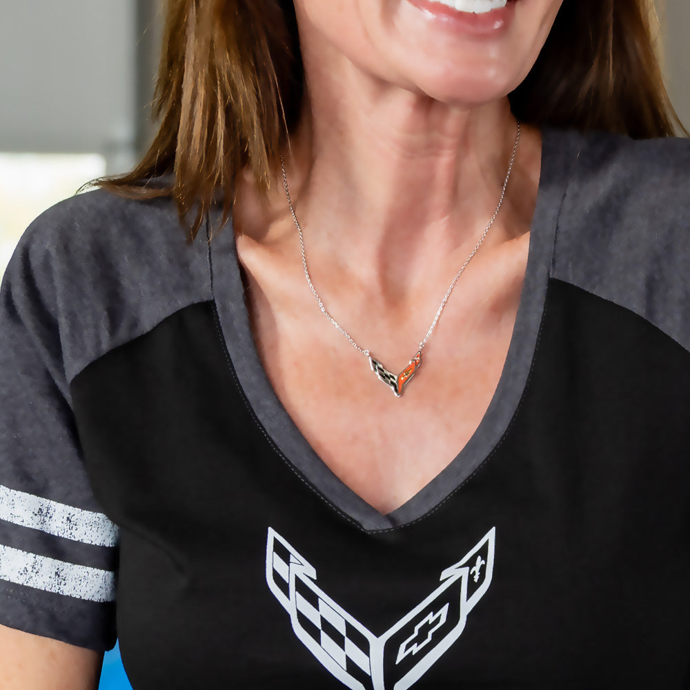 Woman wearing the C8 Corvette Full Color Emblem Sterling Silver Necklace