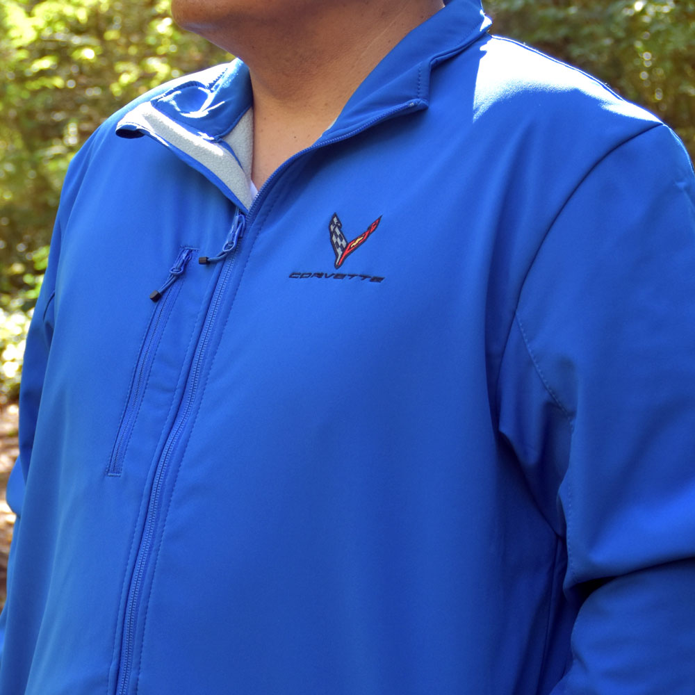 Man wearing the C8 Corvette Mens Royal Blue Trail Softshell Jacket