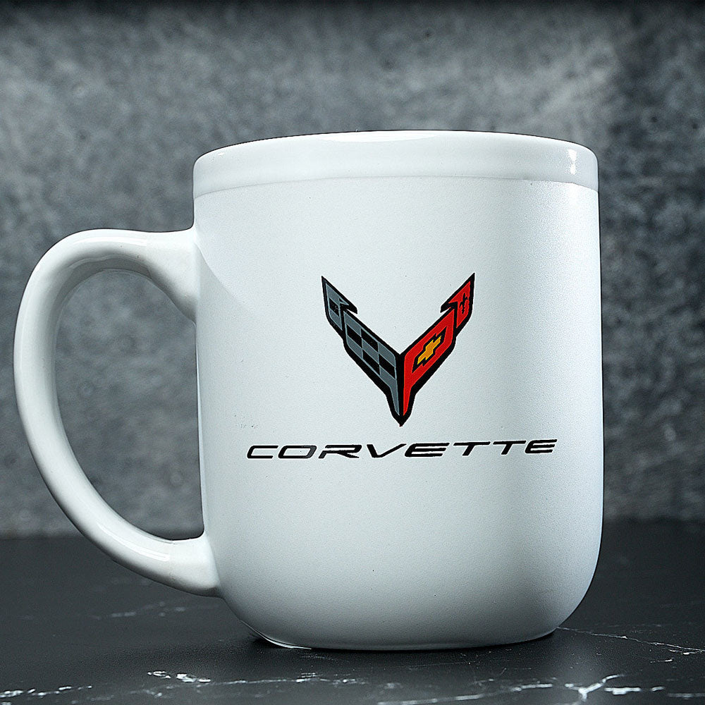 C8 Corvette Modelo White Coffee Mug sitting on a table