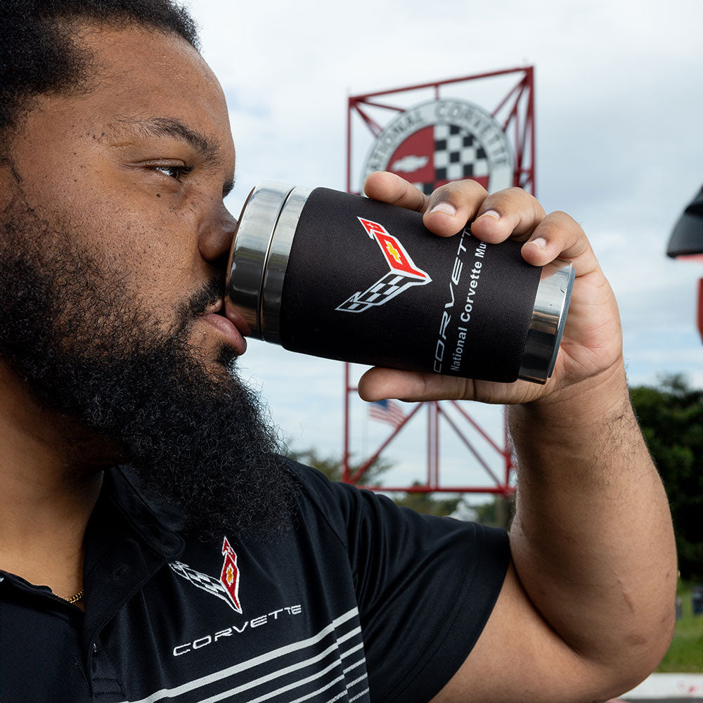 Man drinking from the C8 Corvette Mugzie