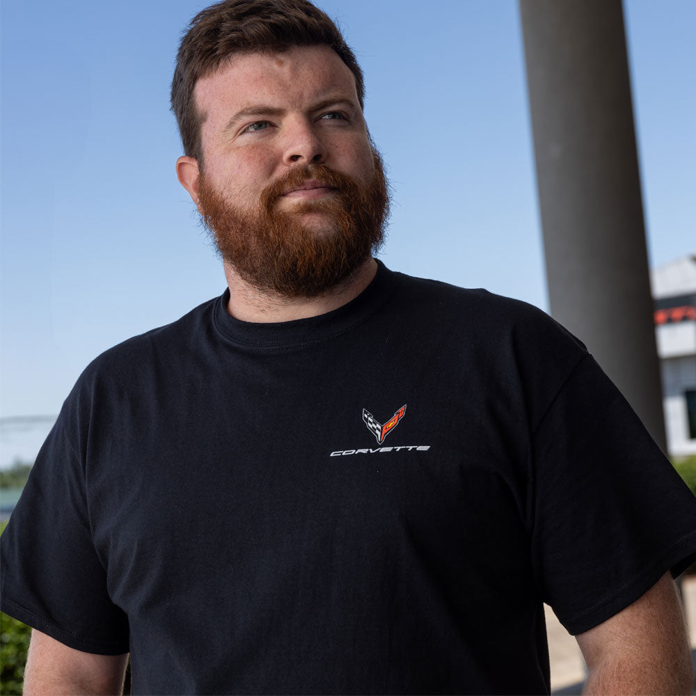 Man wearing the C8 Corvette Retro Black T-shirt showing the C8 emblem on the front left chest