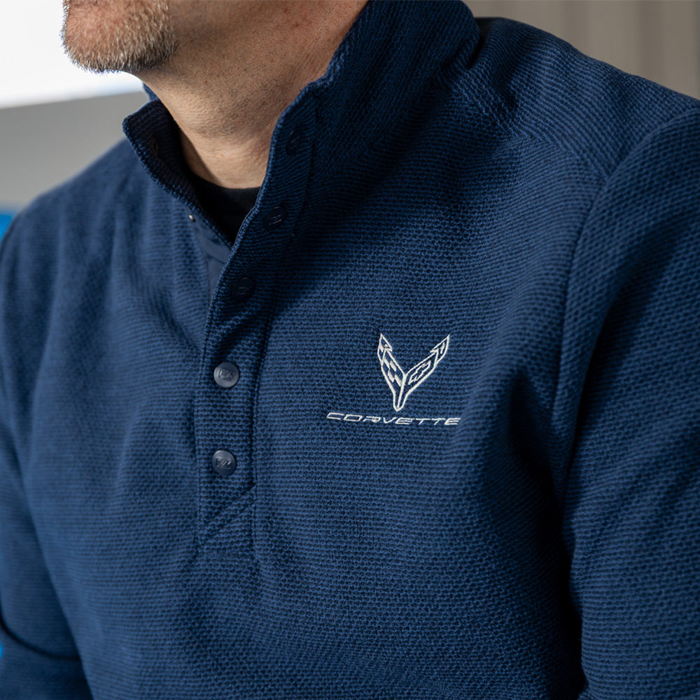Close up of the C8 emblem on the C8 Corvette Textured Fleece Snap Front Pullover