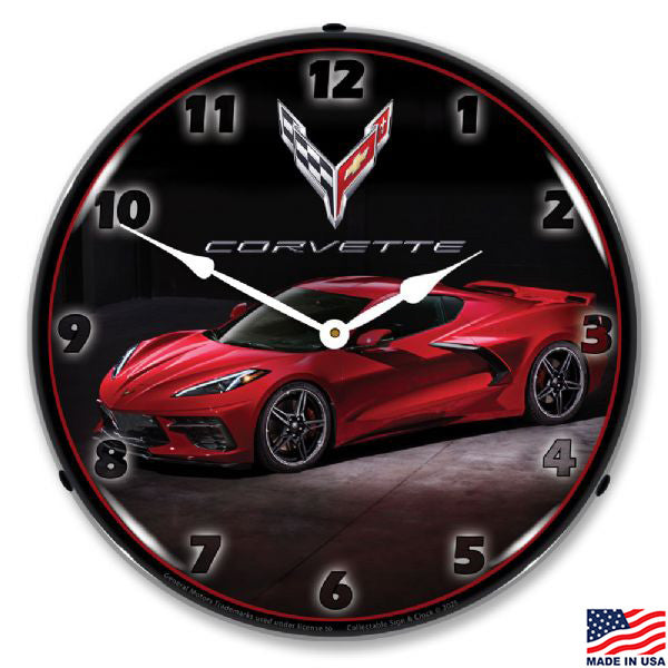 Wall clock featuring a red C8 Corvette on a black background