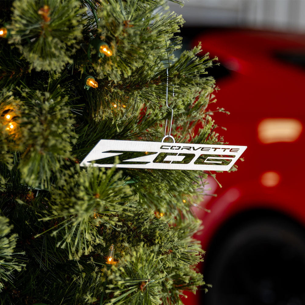 C8 Z06 Corvette Emblem Ornament shown hanging on a tree