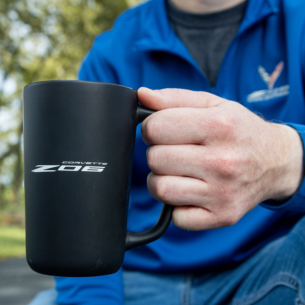 Man holding the C8 Z06 Corvette Matte Black Coffee Mug