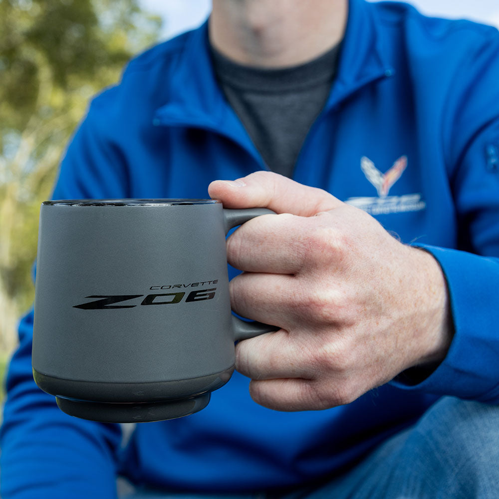 Man holding the C8 Z06 Corvette Two-Tone Gray Coffee Mug