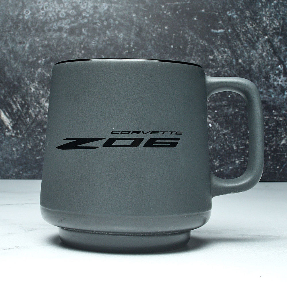 C8 Z06 Corvette Two-Tone Gray Coffee Mug sitting on a table