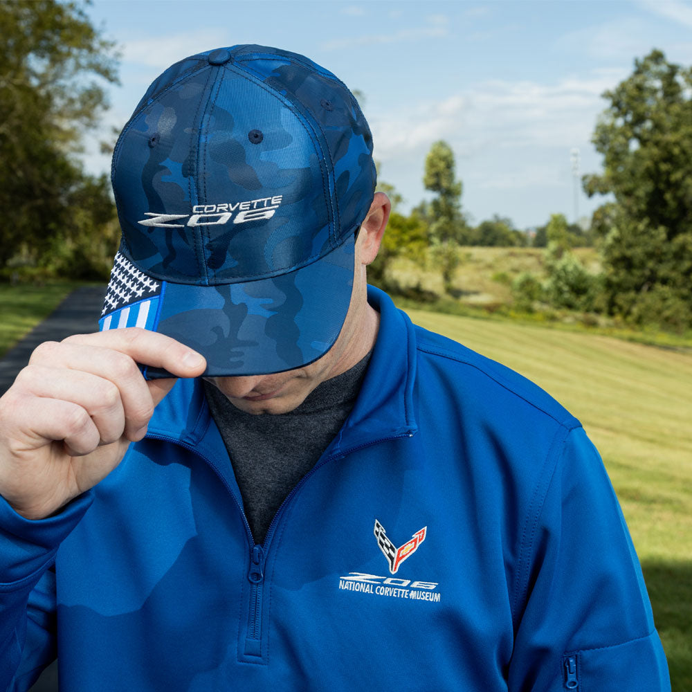 Man wearing the C8 Z06 Flag Brim Blue Camo Cap