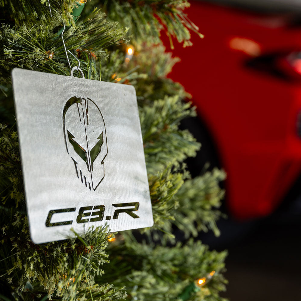 C8R Corvette Racing Jake Ornament shown hanging on a tree