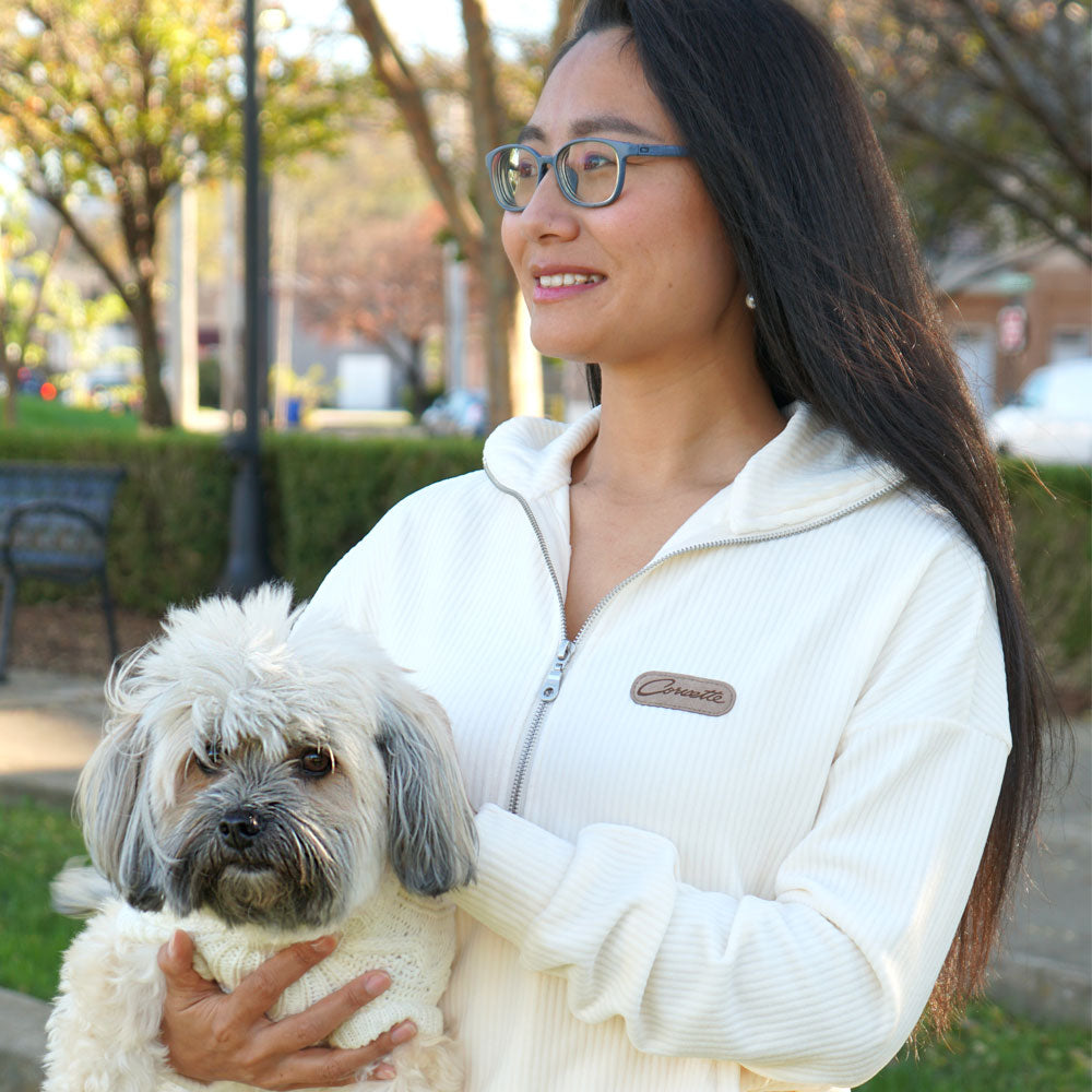 Close up of the emblem on the Corvette Ladies Corded Half Zip Vanilla Bean Pullover