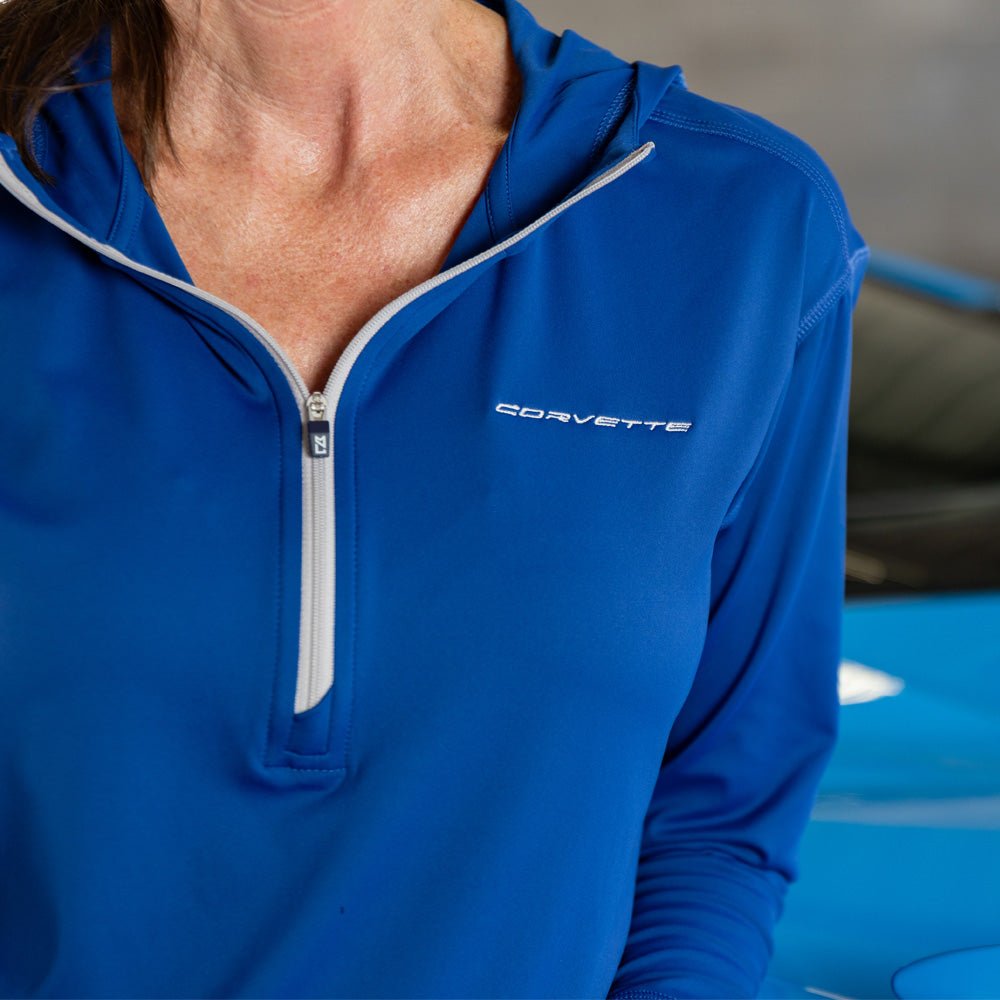 Close up of the Corvette script embroidered on the left chest of the Corvette Ladies Half-Zip Tour Blue Hooded Pullover.