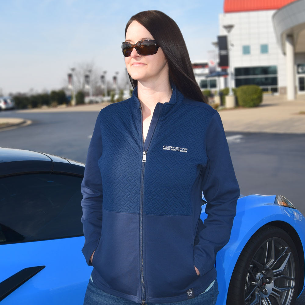 Woman wearing the Corvette Ladies Quilted Navy Jacket 
