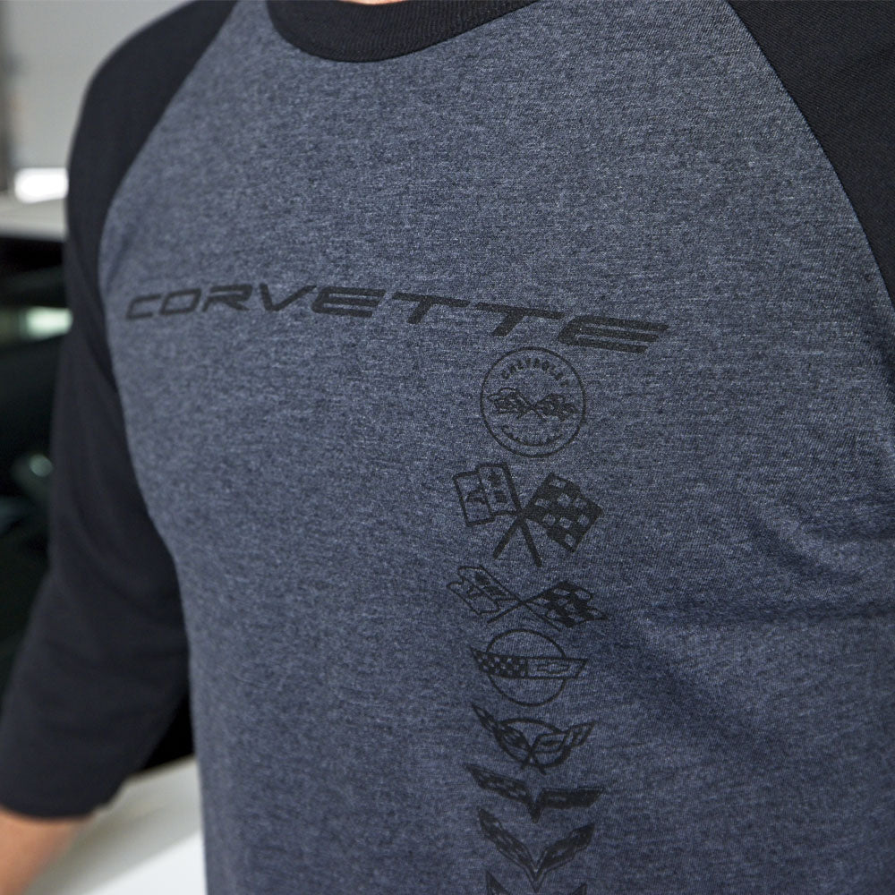 A close up of the emblems on the front of the Corvette Multi Emblem Distressed Baseball Jersey.