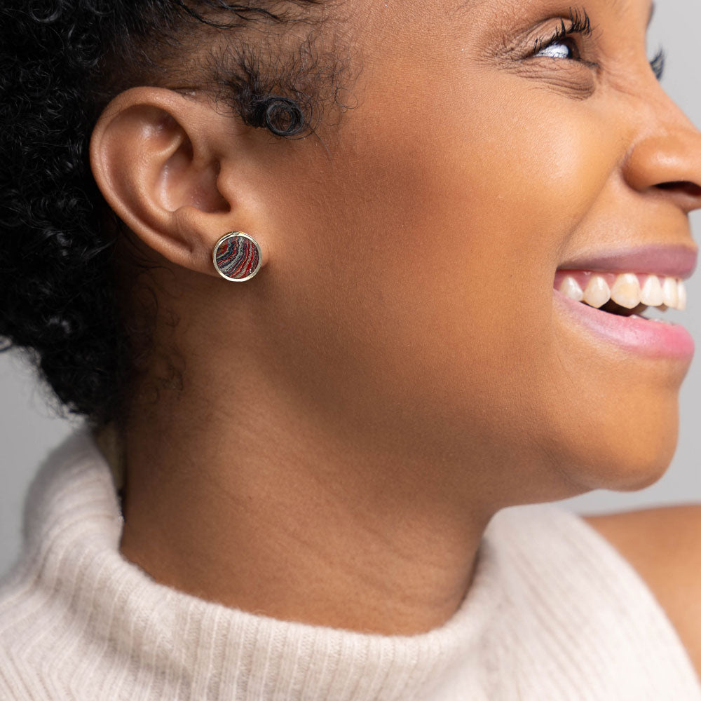 A woman wearing the Corvette Paint Brittany Stud Earrings.