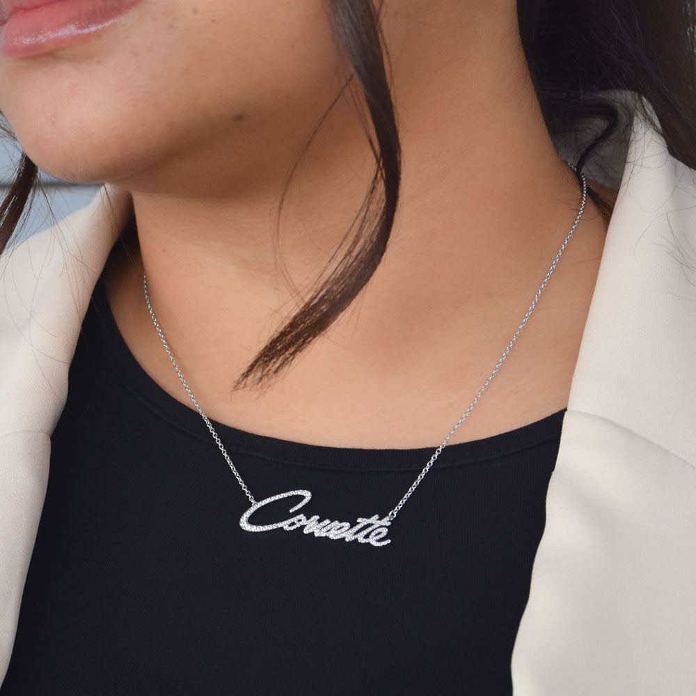 Woman wearing the Corvette Pave Script Sterling Silver Necklace
