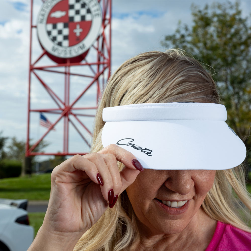 Woman wearing the Corvette Script Clip-On White Visor 