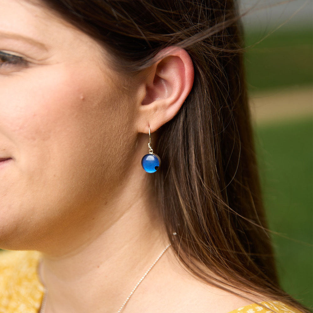 Crash Jewelry Elkhart Lake Blue Dangle Circle Earrings shown on a model