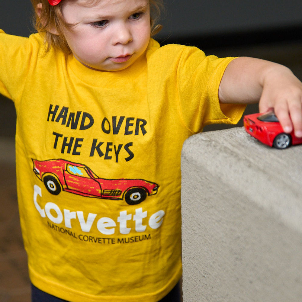 A toddler wearing the Hand Over the Keys Toddler T-shirt 