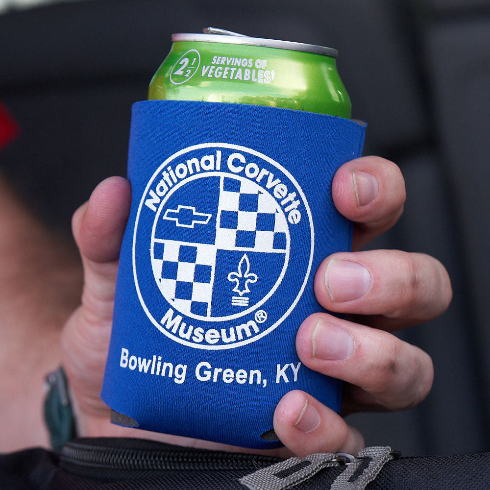 Person holding a can with the NCM Collapsible Can Chiller