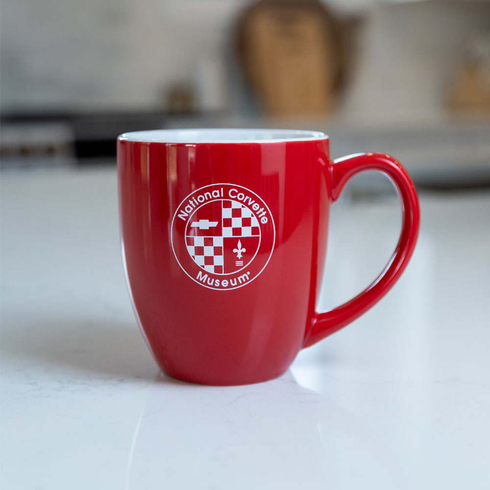 NCM Red Bistro Mug shown on a kitchen counter