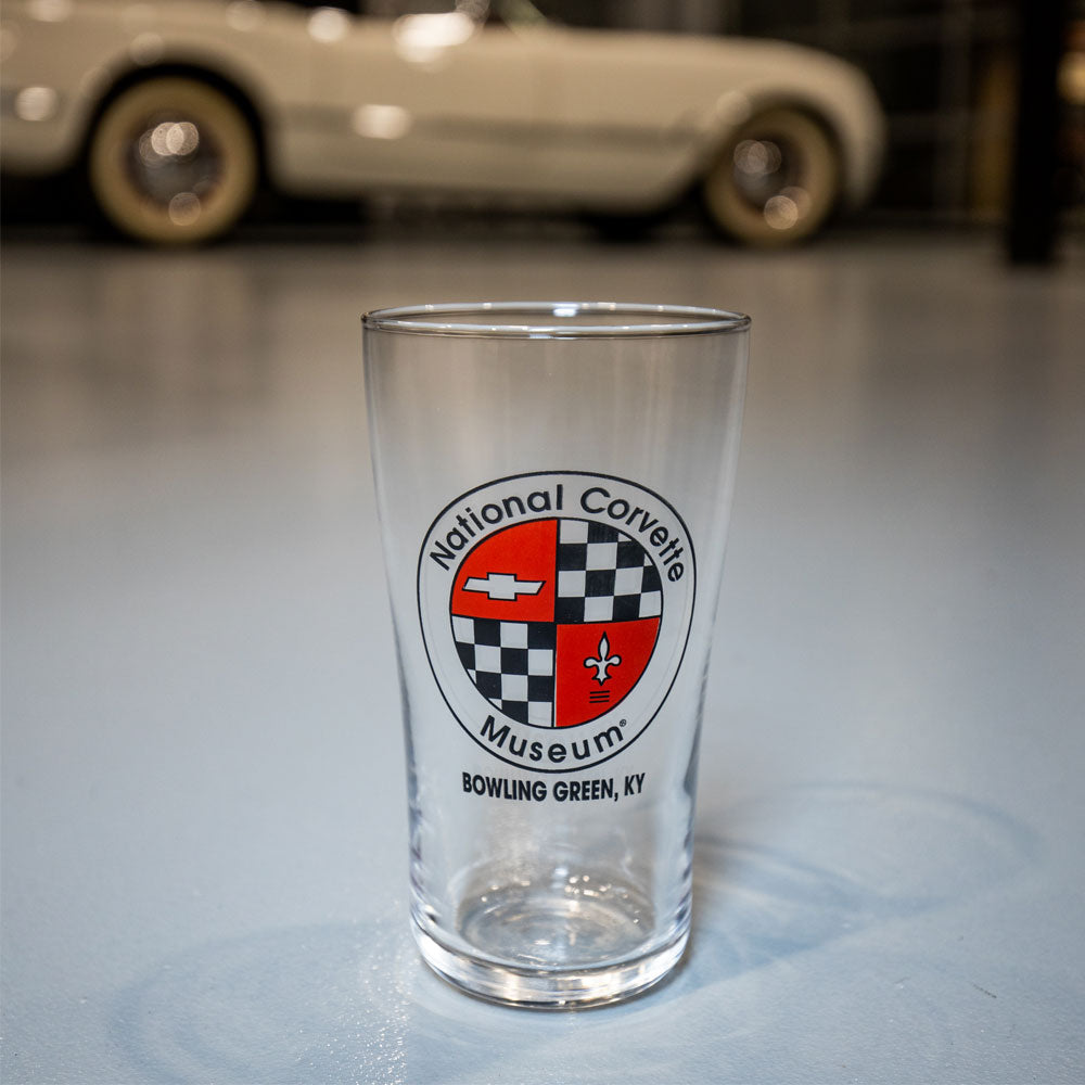 National Corvette Museum Logo Cooler Glass shown in front of a C1 Corvette