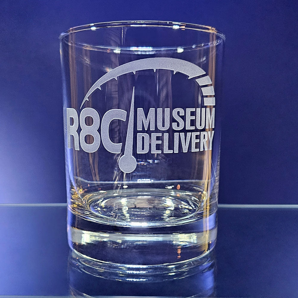 Clear glass with 'R8C Museum Delivery' text and logo on a blue background