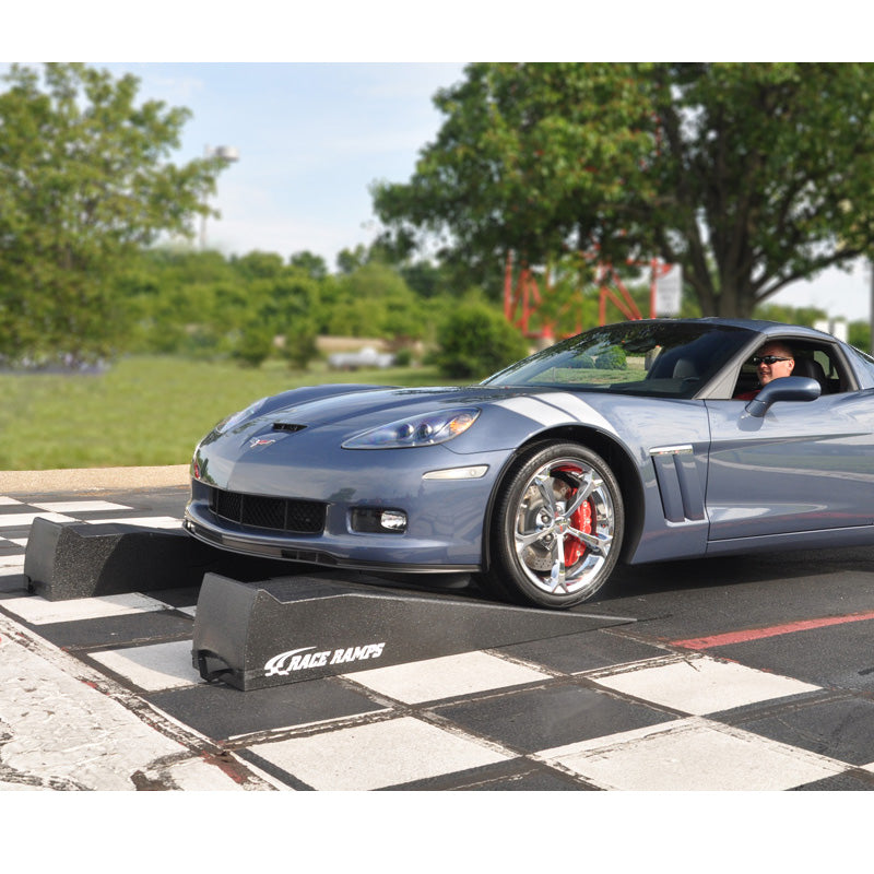 Image of a Corvette driving up the Race Ramps XT 67 Inch 