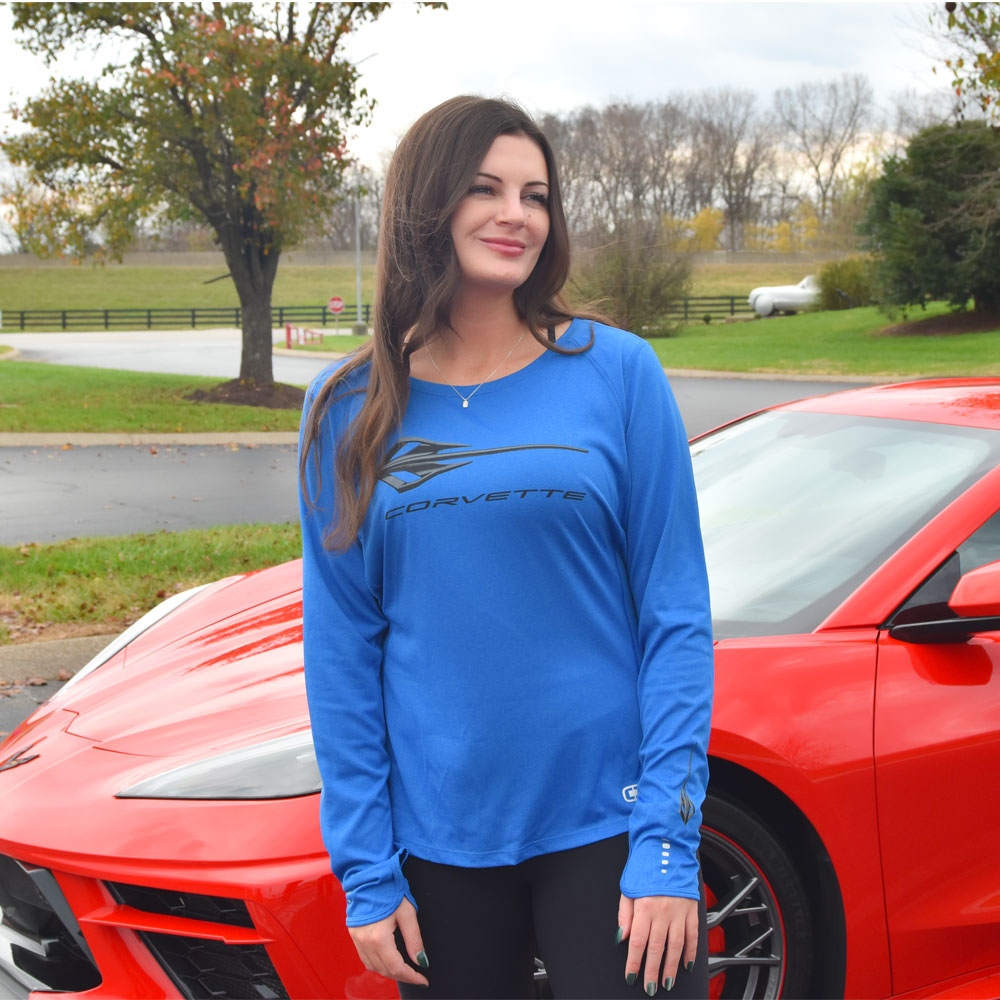 Woman wearing the Stingray Corvette Ladies Lux LS Royal Blue Top 