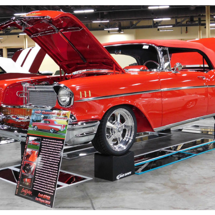 Image of a red Chevrolet Bel Air raised on a Wheel Crib