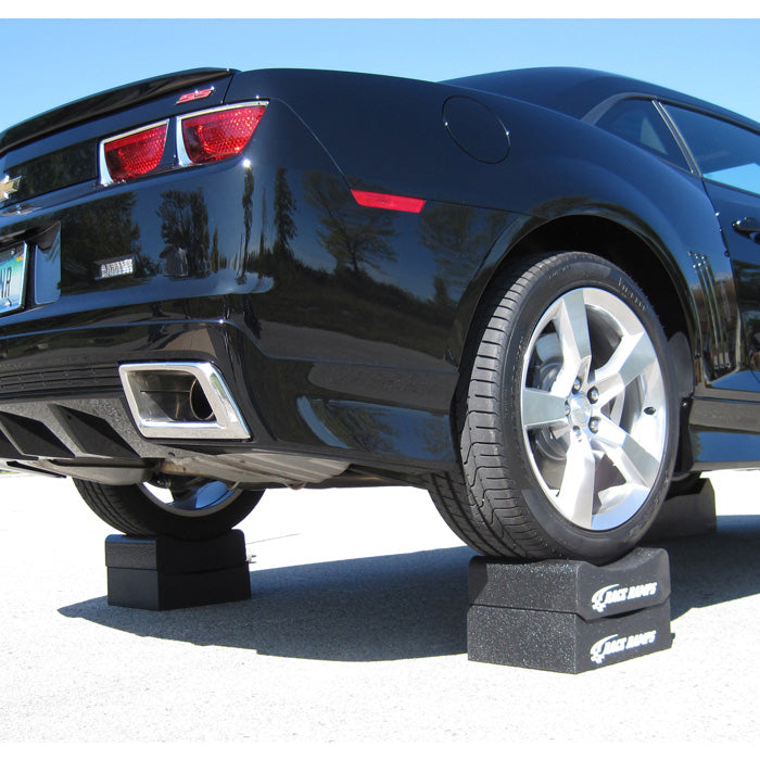 Image of a Chevrolet Camaro raised up on a Two piece wheel crib set